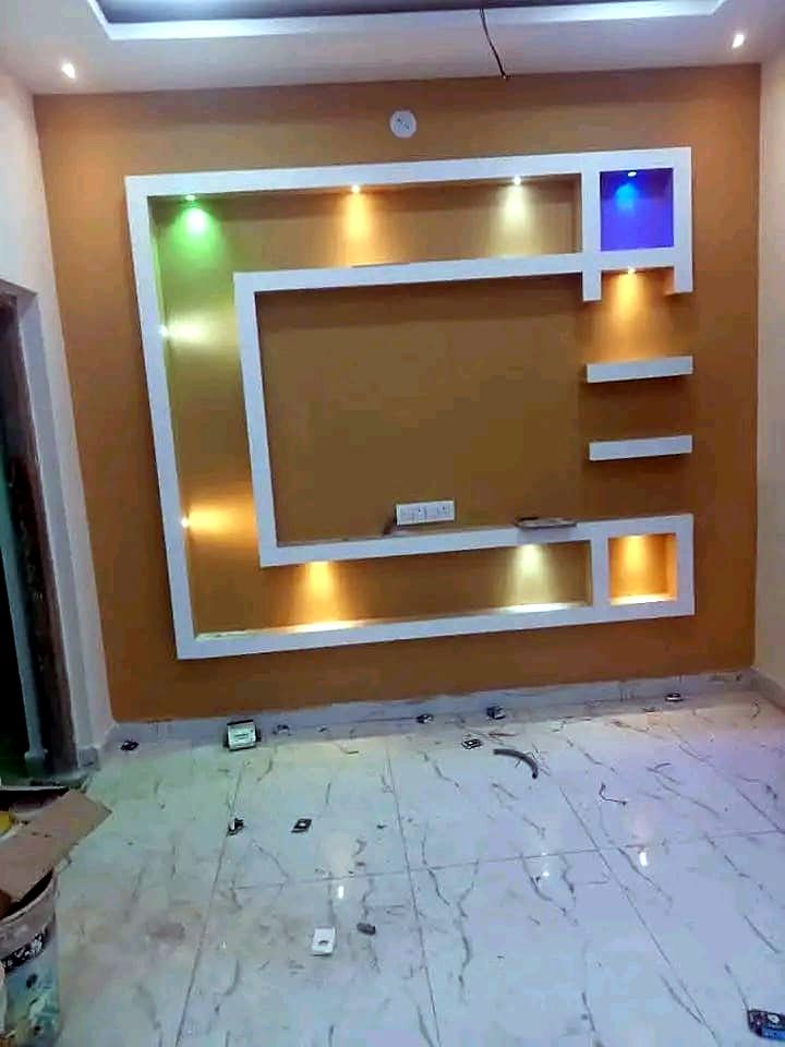 Wall feature with recessed LED lighting under construction