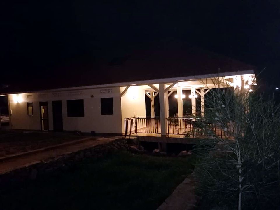 Bungalow exterior lighting at night