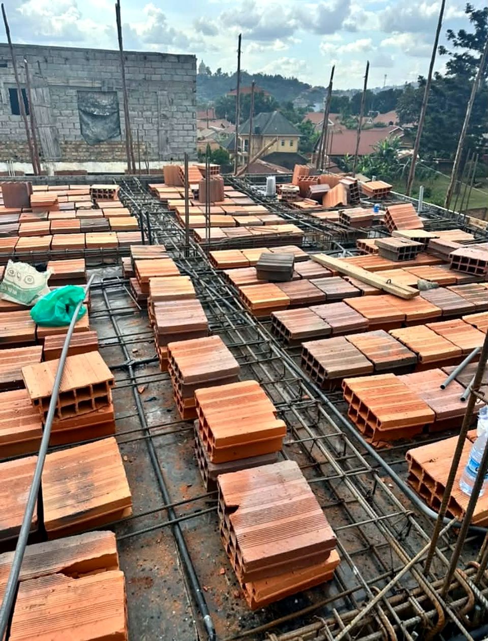 Hollow-block slab with conduits laid before casting